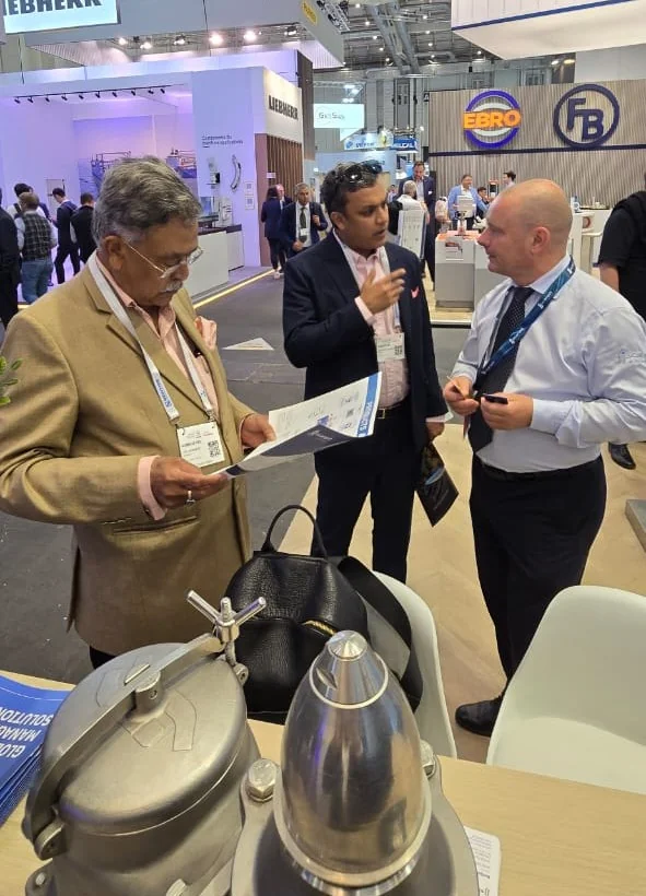ASMACS delegation in a technical discussion with a marine technology provider at SMM Hamburg 2026